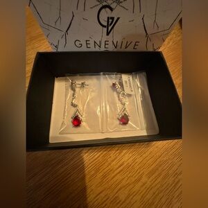 Dangling ruby and diamond silver drop earrings